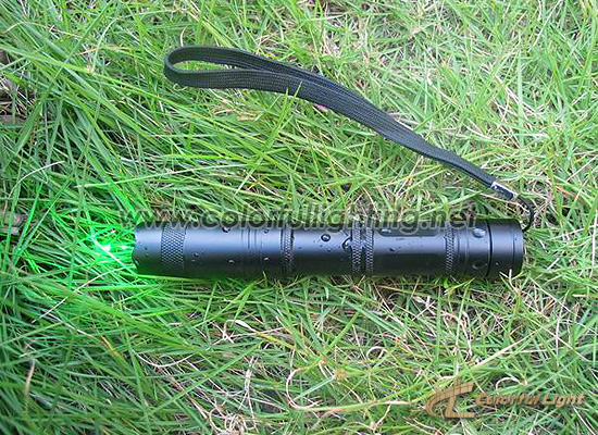 Waterproof Green Laser Pointer On The Grassland